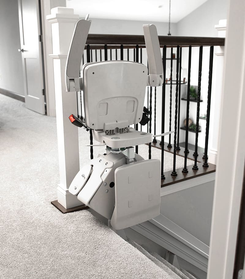 Elan-Straight-Indoor-Stair-Lift-07 Bruno Elan Straight Stairlift at top of Staircase in Folding Position