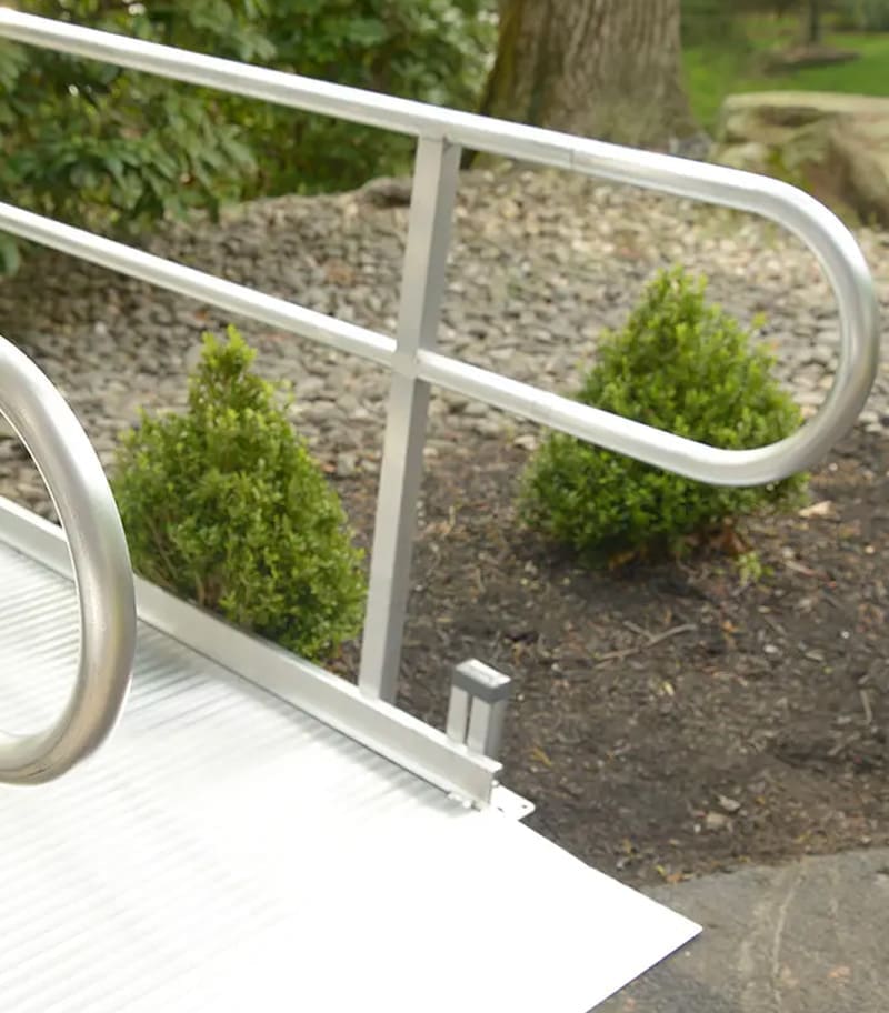 Handrail end-loops for sleek appearance and comfortable transition to aluminum residential wheelchair ramp