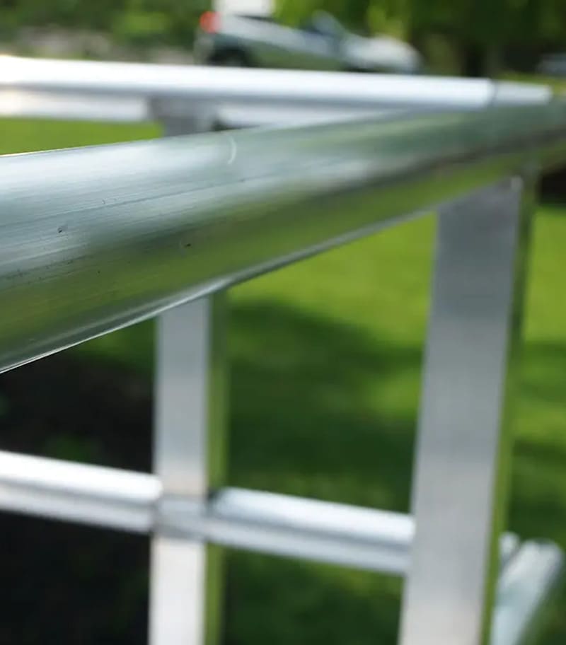 Continuous two-Line aluminum handrails on residential ramp from National Ramps.